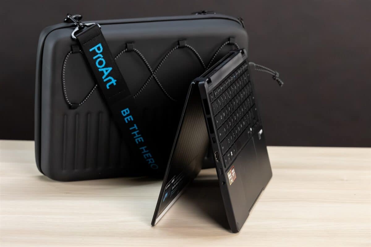 Laptop 2-in-1 și husă de protecție pentru gadgeturi high-tech, portabilitate și stil modern.